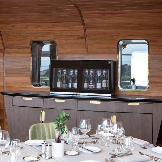 8-bottle wine bar - brings wine to the correct temperature and preserves open bottles