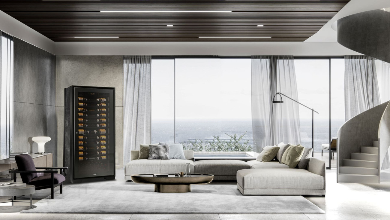 The Royale wine cabinet installed in the exceptional living room of a luxury villa by the sea with an exceptional panorama. - EuroCave