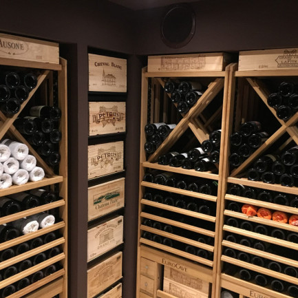 Wine cellar with modular wooden wine storage racks EuroCave Modulothèque.