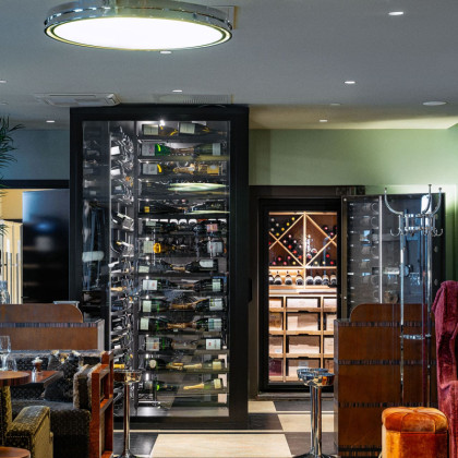 Luxurious black metal Modulo-X presentation wine cellar at Sommerro House restaurant, Norway.